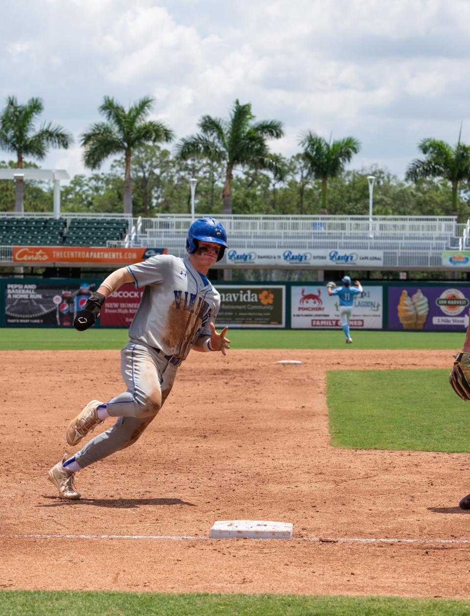 PHOTO BY KAT EDWARDS Lakeland Christian's Zachary Lester rounds 3rd on his way home during Saturday's 2A State Championship game against St. Johns Country Day