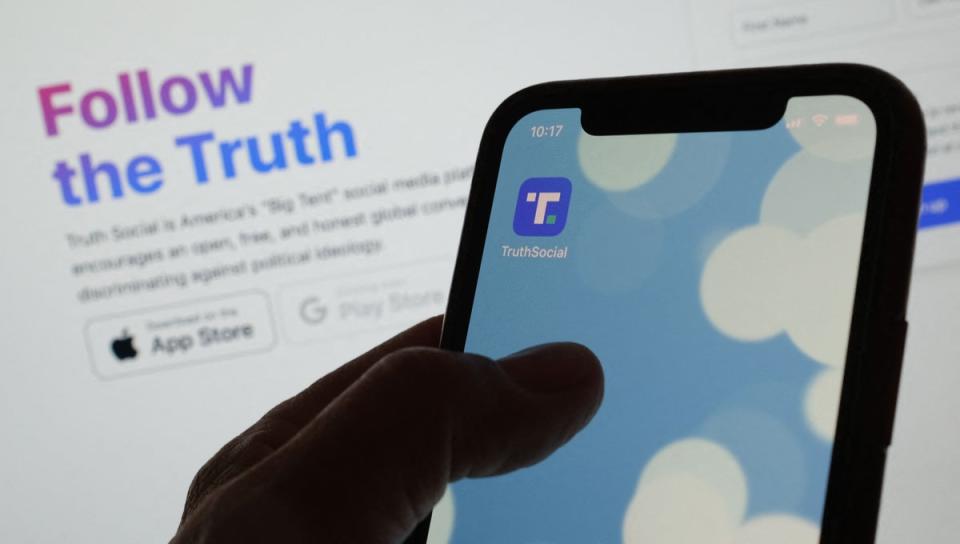 Donald Trump’s social media app Truth Social’s logo on a smartphone in February 2022 (AFP via Getty Images)