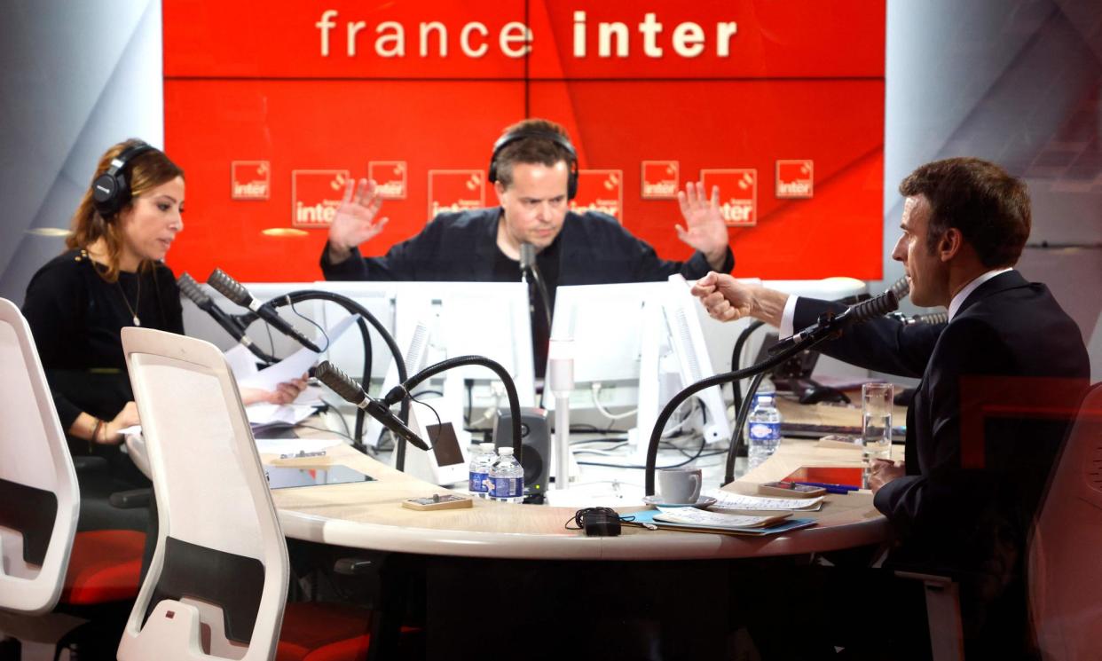 <span>Emmanuel Macron during an appearance on a France Inter show in 2022. The radio station is France’s most popular.</span><span>Photograph: Ludovic Marin/AFP/Getty Images</span>