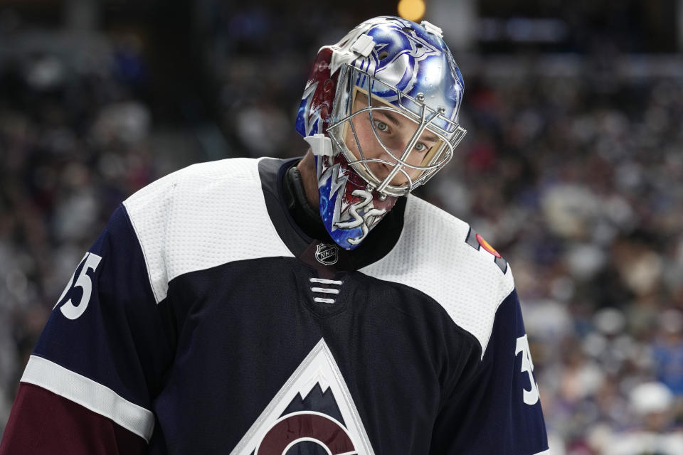 Colorado Avalanche goaltender Darcy Kuemper reacts after giving up a goal to the St. Louis Blues in the second period of an NHL hockey game Saturday, Oct. 16, 2021, in Denver. (AP Photo/David Zalubowski)