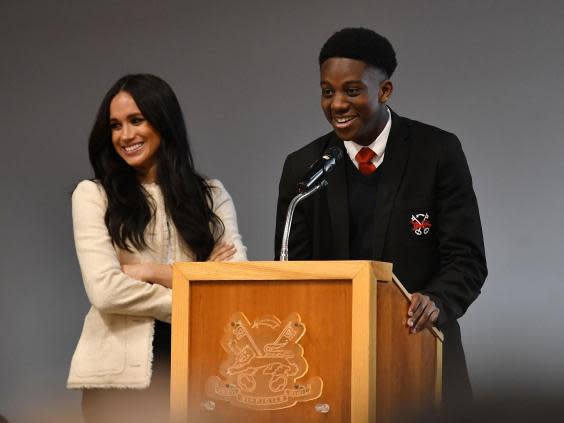 Meghan invited the school's headboy to join her on stage (PA)