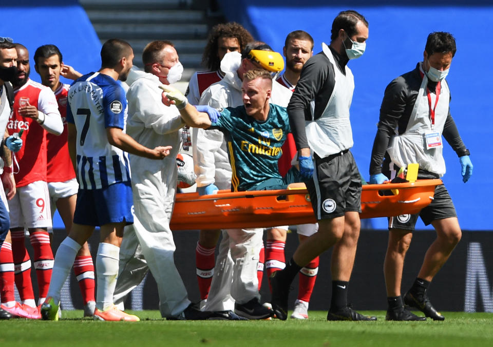 Arsenal keeper Bernd Leno (center) was not happy with Brighton's Neal Maupay (7). (Mike Hewitt/Pool via REUTERS)