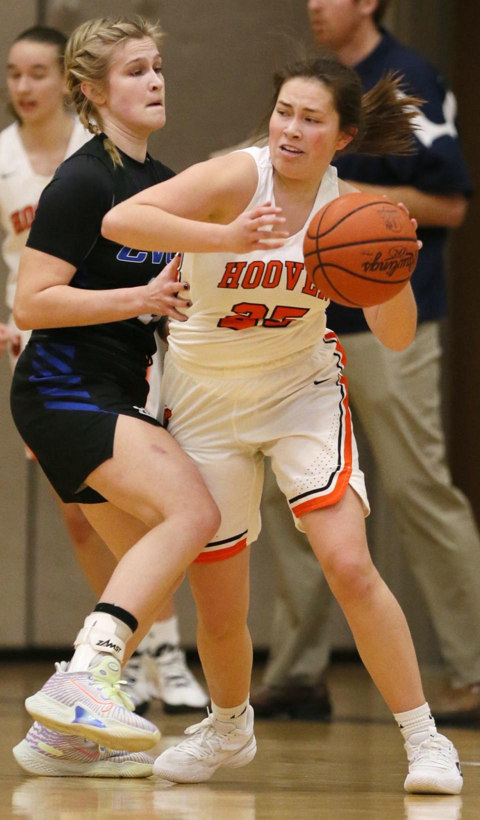 Cuyahoga Valley Christian Academy's Kylie Bettinger defends Hoover's Lauren Rose in the Girls basketball game at Hoover High School in North Canton. The Lady Vikings beat the Royals 63 to 24.