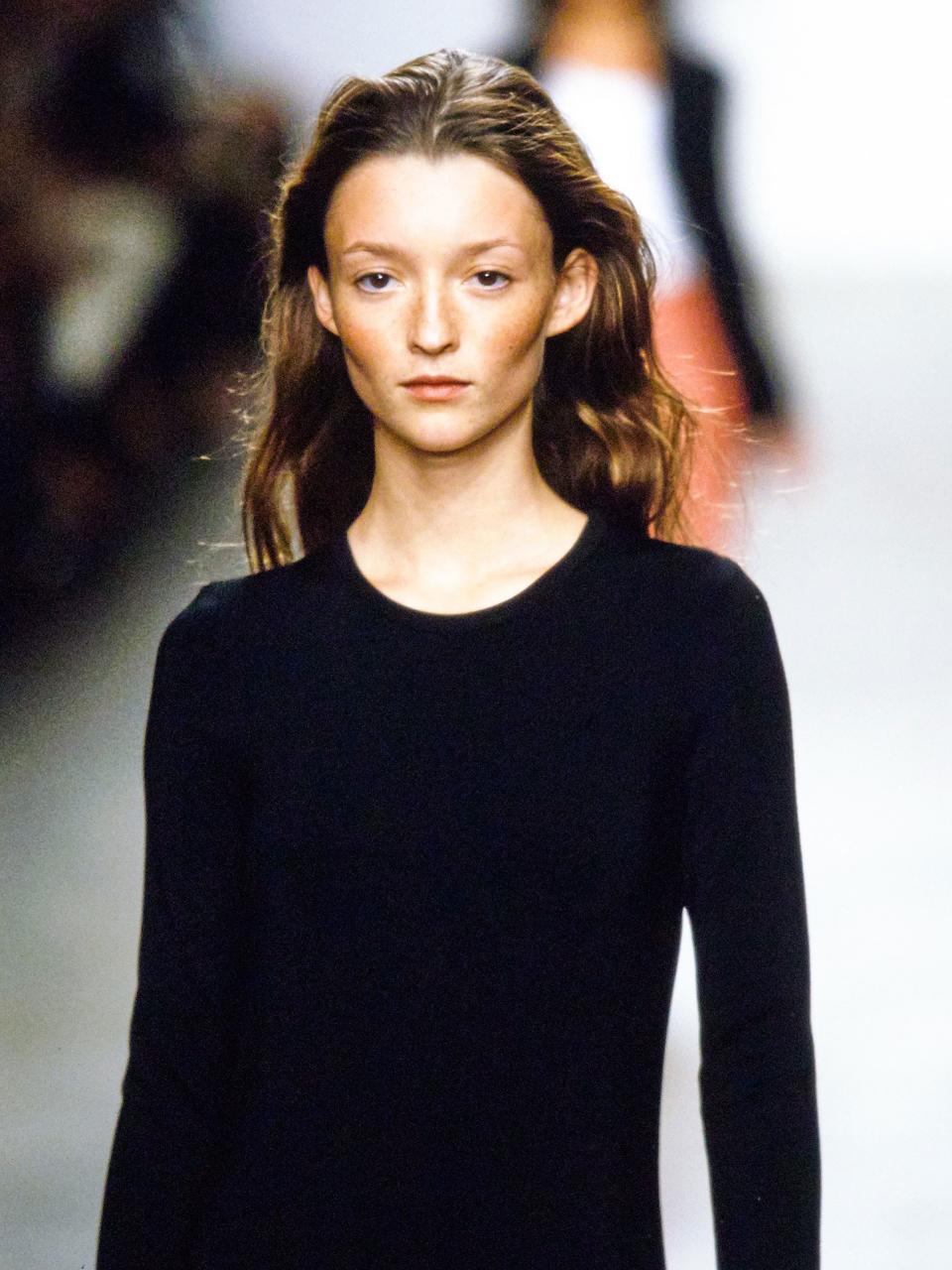 From a fresh-faced Kate Moss on the Spring 1994 runway to a subtle speck of silver in Fall 2017, less-is-more beauty has long reigned at Calvin Klein.