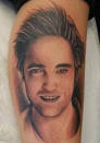 <p>Yes, it is a Robert Pattinson portrait. On someone's arm. In the form of a tattoo. What can we say, there really are some true 'Twihards' out there!<br><br><a rel="nofollow" href="http://au.thehype.yahoo.com/galleries/g/-/11345845/celebrity-ufo-enthusiasts/11345861/" data-ylk="slk:PICS: Celebrity UFO Enthusiasts;elm:context_link;itc:0;sec:content-canvas" class="link ">PICS: Celebrity UFO Enthusiasts</a></p>