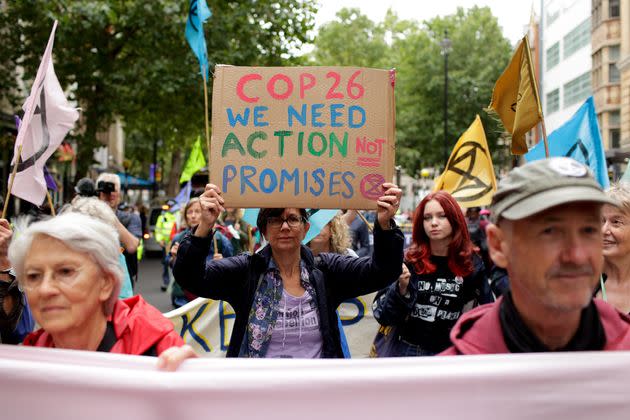 Members of climate change activist movement Extinction Rebellion march along Charing Cross Road on August 23, 2021 (Photo: Anadolu Agency via Getty Images)