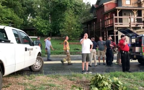 Rescue personnel are seen after an amphibious "duck boat" capsized and sank, at Table Rock Lake near Branson, Stone County - Credit: Reuters