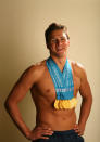 Swimmer Ryan Lochte poses with the gold medals he recently won at the 2011 FINA World Championships during a photo shoot on August 3, 2011 at the Crown Plaza Cabana Hotel in Palo Alto, California. Lochte won a total of six medals at the championships, five golds and one bronze. (Photo by Ezra Shaw/Getty Images)