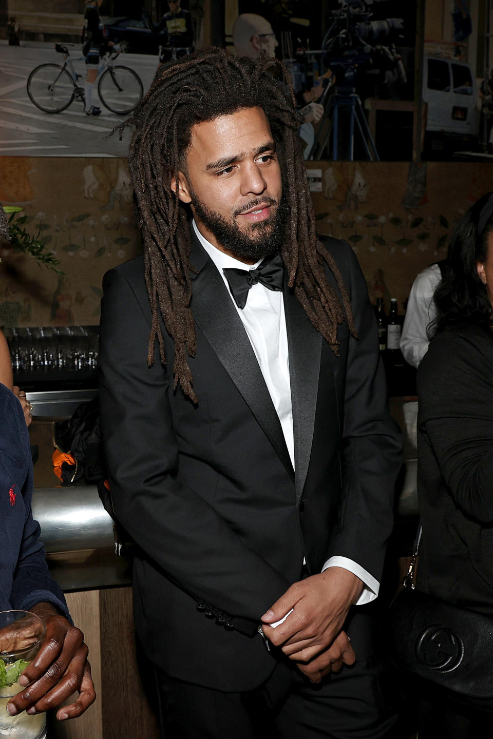 J. Cole Wearing Suit