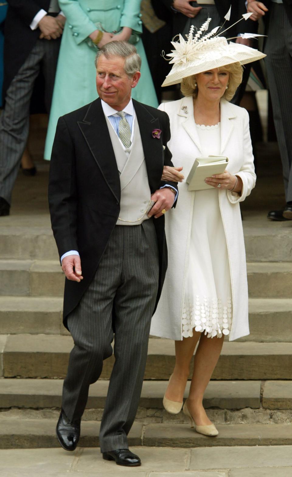 <h1 class="title">Prince Charles & Camilla Bowles</h1><cite class="credit">Shutterstock</cite>