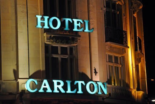 The facade of the Carlton Hotel in Lille. French police have detained former IMF chief Dominique Strauss-Kahn for questioning over allegations he took part in orgies in Paris and Washington with prostitutes paid for by businessmen