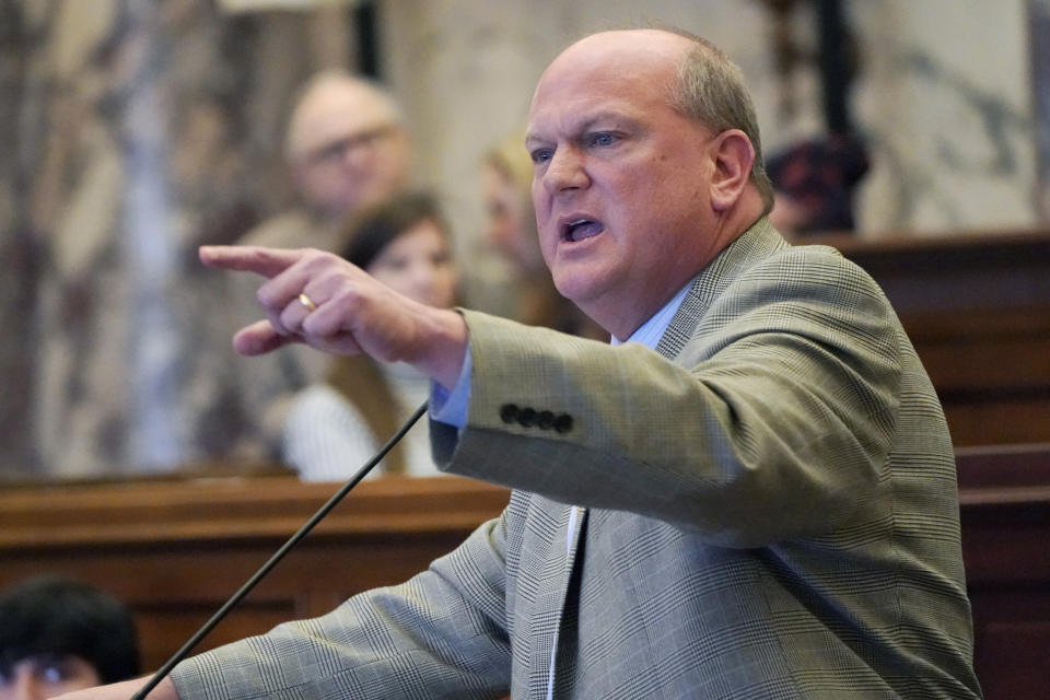 State Sen. Brice Wiggins, R-Pascagoula, speaks Wednesday, March 9, 2022, at the Mississippi Capitol before the state Senate passed a version of a bill that says Mississippi government entities could not withhold services or refuse jobs to people who choose not to get vaccinated against COVID-19. The bill will go to final negotiations between the House and Senate. (AP Photo/Rogelio V. Solis)