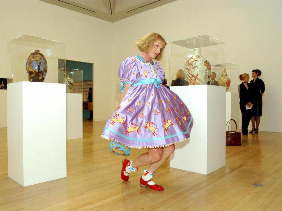 Grayson Perry as his transvestite alter ego, Claire, who collected the Turner Prize in 2003 in a Bo Peep-style dress at Tate Britain (Rex)
