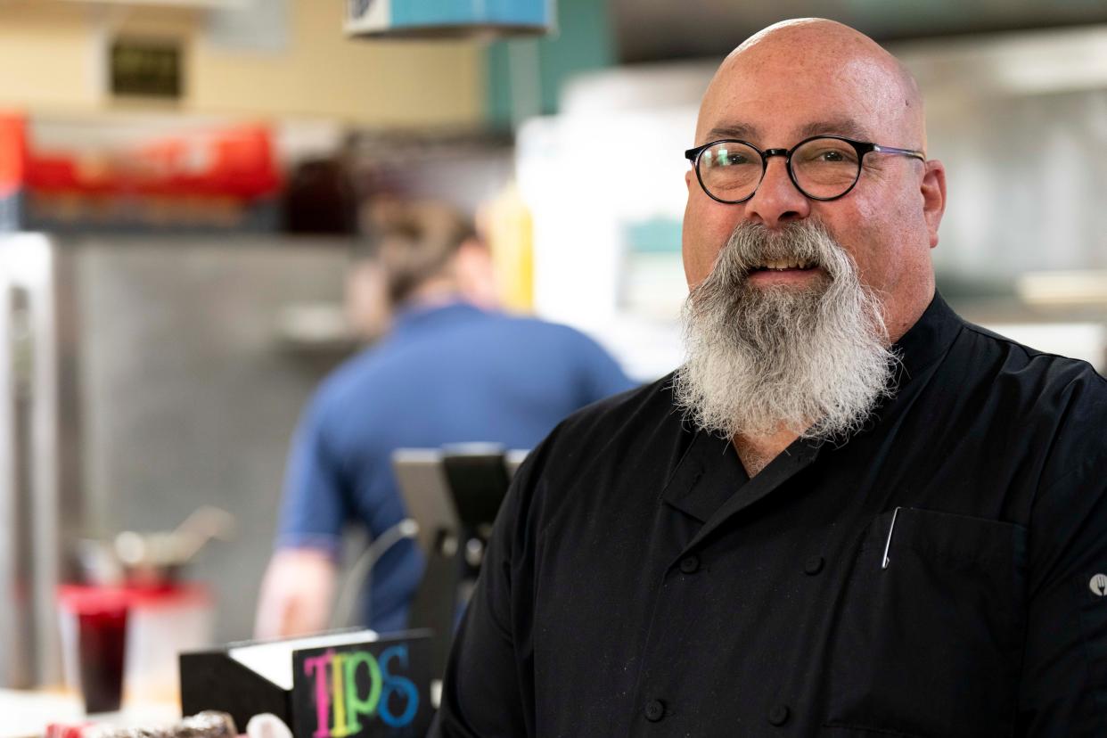 Larry Misleh, owner, stands at the Madison Diner in Madisonville in 2023.