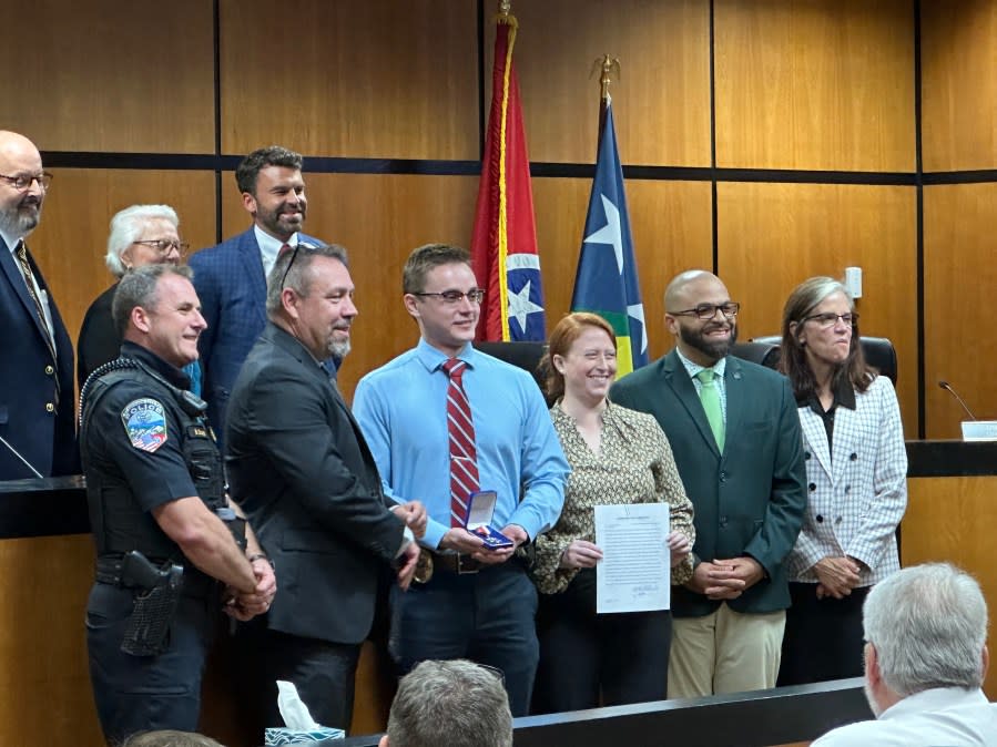 Photo: JCPD Investigators Timothy Hensley and Ashley Ellenburg were recognized by the Johnson City Commission for their lifesaving efforts. (WJHL)