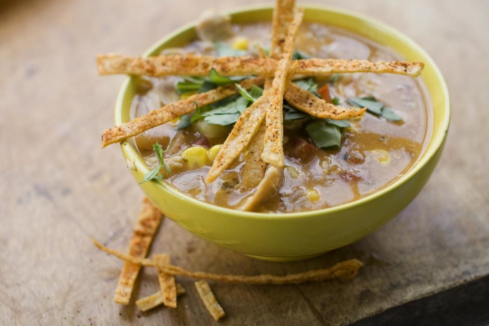 In this image taken on July 8, 2013, a bowl of southwestern corn and chicken chowder with tortilla crisps is shown in Concord, N.H. (AP Photo/Matthew Mead)