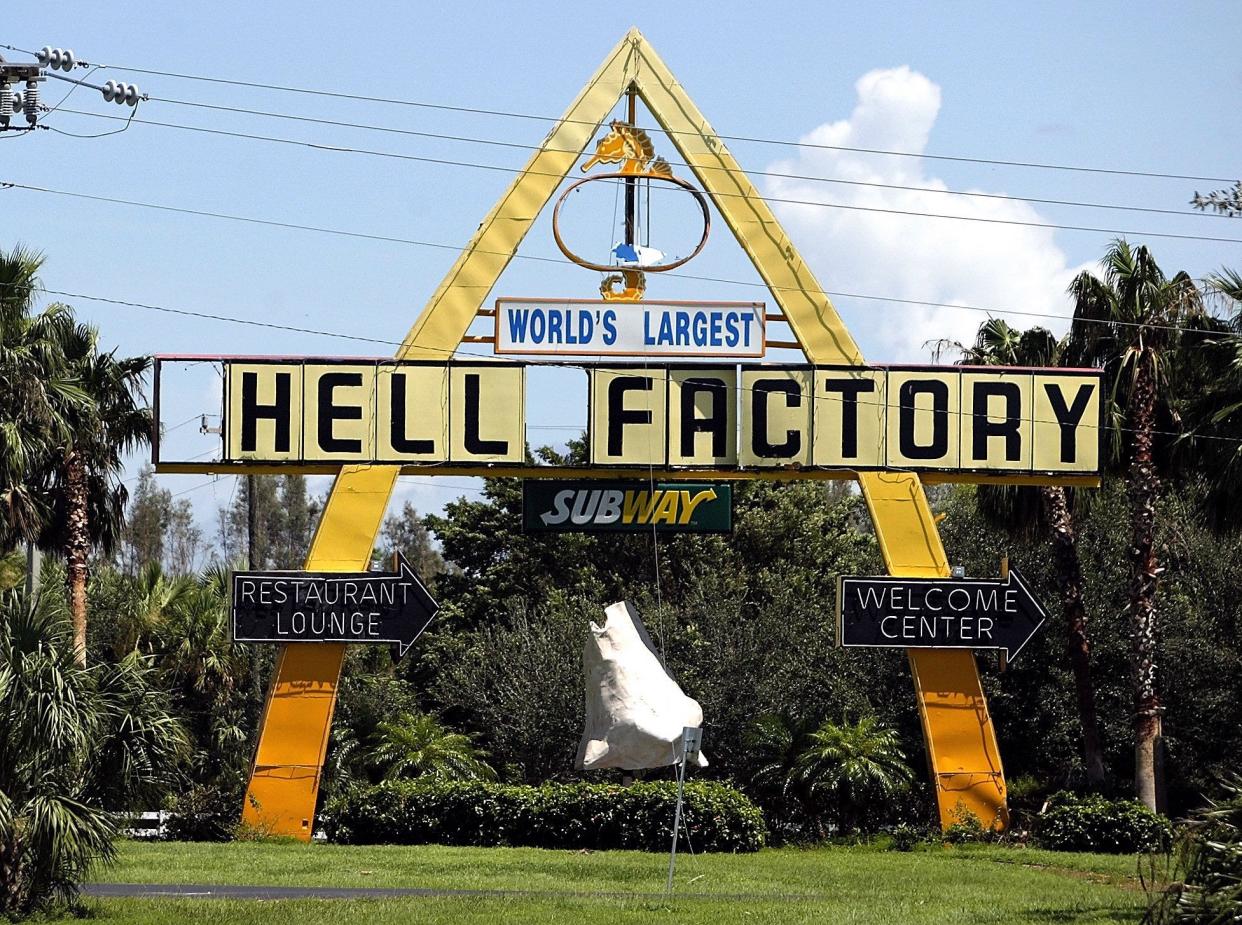.The sign to the Shell Factory on Highway 41 leading into Punta Gorda shows a little damage from Hurricane Charley after it made landfall Aug. 13, 2004.
