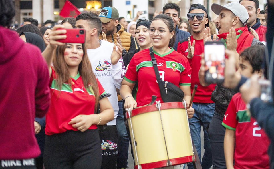 Fans, pictured here celebrating in the streets of Rabat after Morocco's win over Belgium.