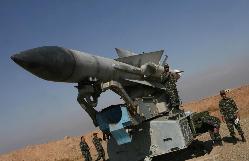 iranian soldiers stand near a s 200 surf