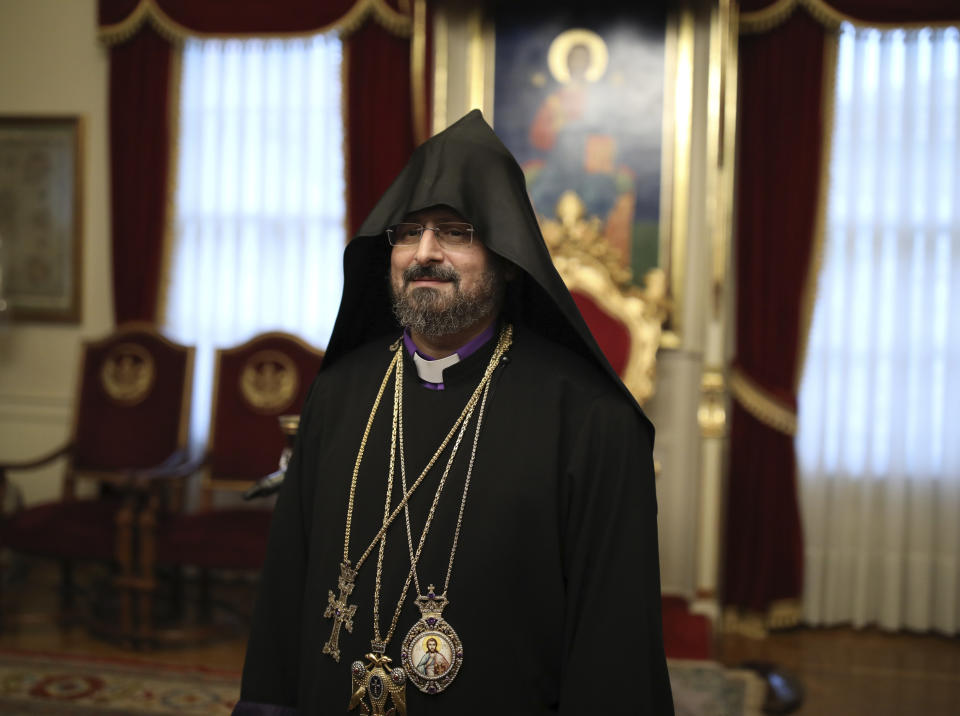 Bishop Sahak Masalyan speaks during a special ceremony after his election as the new Patriarch of Turkey's Armenian community, in Istanbul, Wednesday, Dec. 11, 2019. Armenian community voted on Wednesday Masalyan as its new patriarch, in an election critics say was overshadowed by Turkish government intervention. (AP Photo/Emrah Gurel)