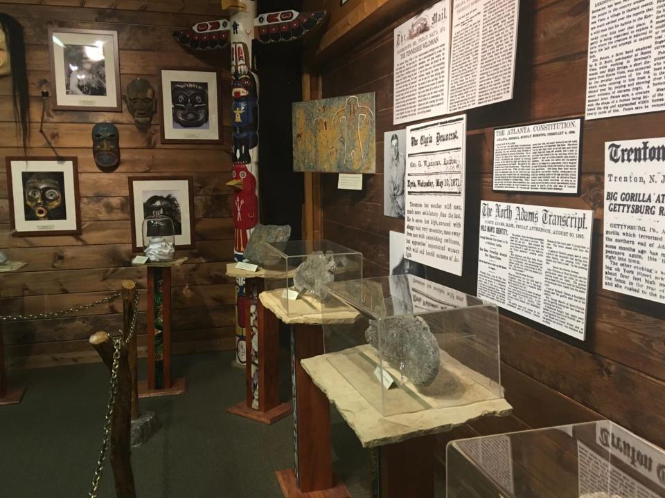 Footprint casts, news articles, and other artifacts line the walls of "Expedition: Bigfoot" in Blue Ridge, Ga.