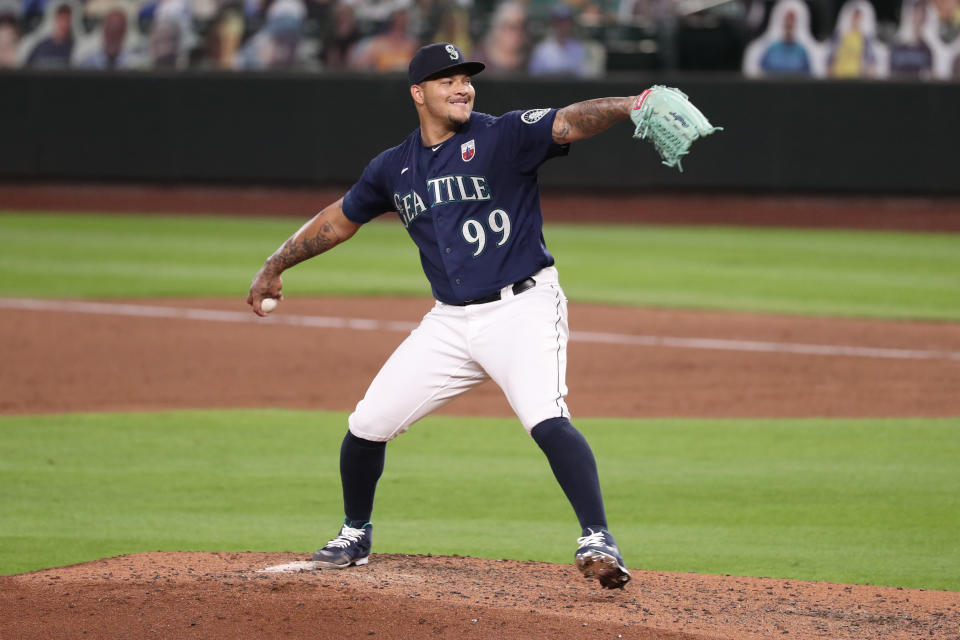 SEATTLE, WASHINGTON - AUGUST 19: Taijuan Walker #99 of the Seattle Mariners pitches in the fifth inning against the Los Angeles Dodgers at T-Mobile Park on August 19, 2020 in Seattle, Washington. (Photo by Abbie Parr/Getty Images)