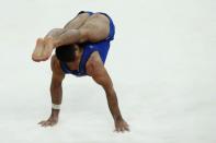 An elastic move by US gymnast Danell Leyva. (Photo by: AFP)