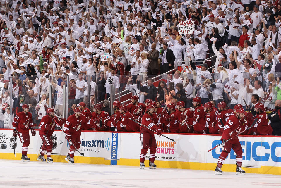 GLENDALE, AZ - MAY 07: Derek Morris #53 (R) of the Phoenix Coyotes celebrates with teammates on the bench after scoring a second period goal against the Nashville Predators in Game Five of the Western Conference Semifinals during the 2012 NHL Stanley Cup Playoffs at Jobing.com Arena on May 7, 2012 in Glendale, Arizona. (Photo by Christian Petersen/Getty Images)