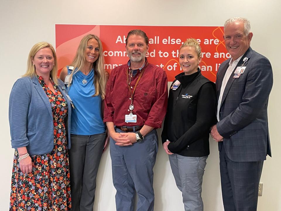 Frisbie Memorial Hospital recently honored its Awards of Distinction winners, including its first Frist Humanitarian Award winner. From left, Megan Gray, chief nursing officer; Colleague of the Year Mel Bieniek, director of rehabilitation services; William Morgan, MD, Frist Humanitarian Award winner – Physician; Nursing Excellence – Compassionate Care winner Annalese Balser, RN; and Tim Jones, chief executive officer. Not pictured Ermelinda Ramsey, RN.