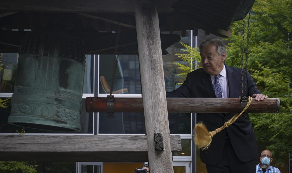 United Nations Secretary-General António Guterres rings the Peace Bell during the U.N. ceremony marking the 40th Anniversary of the International Day of Peace, Friday Sept. 17, 2021 at U.N. headquarters. (AP Photo/Bebeto Matthews)