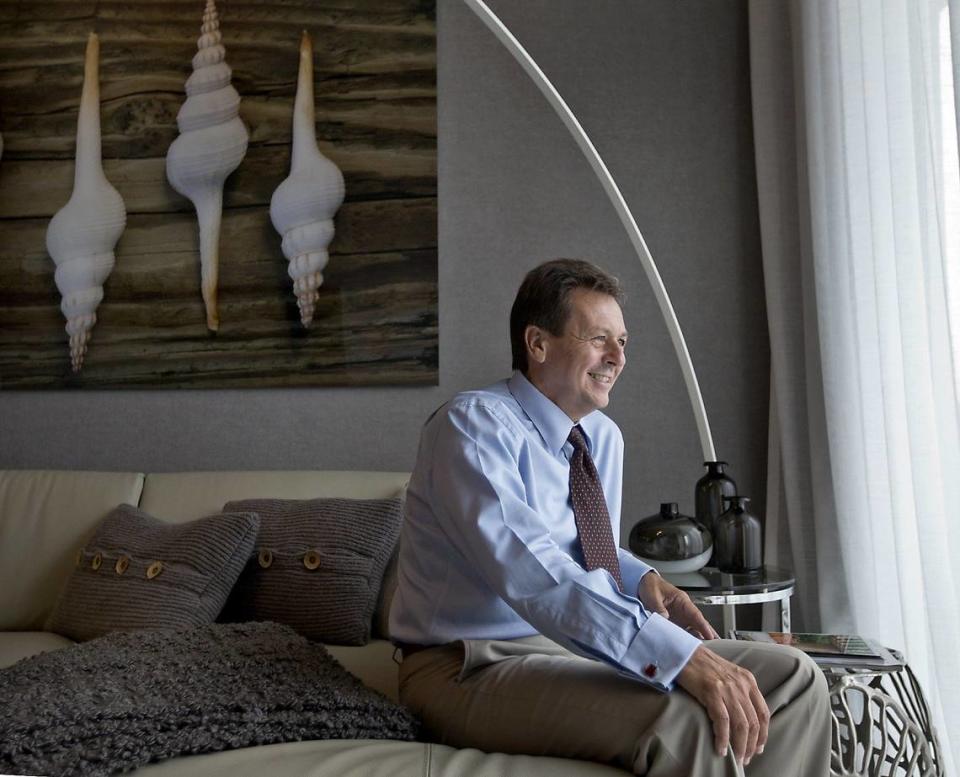 Sergio Pino, the president, CEO and founder of Century Homebuilders Group, takes in the view from a two-bedroom unit at his Midtown Doral residential complex sales center on Monday, Aug. 8, 2016.