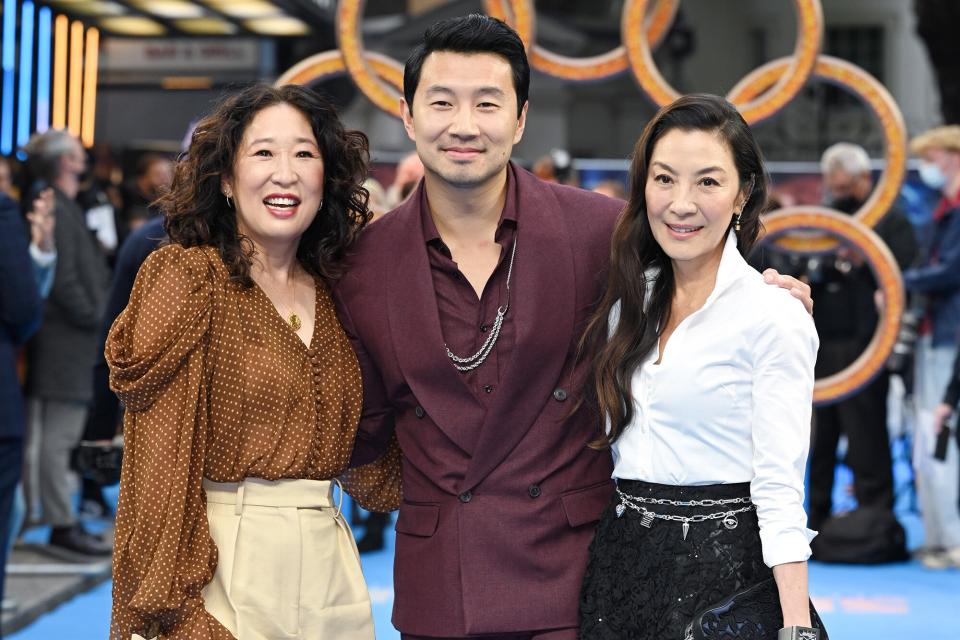 Simu Liu, Michelle Yeoh and Sandra Oh attend the "Shang-Chi and the Legend of the Ten Rings" UK Gala Screening at Curzon Cinema Mayfair on August 26, 2021 in London, England