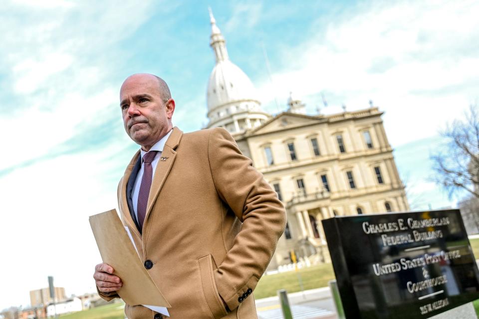 James Tarasca, Special Agent in Charge of the FBI in Michigan, leaves the podium after a news conference to announce charges in a public corruption scheme on Thursday, April 6, 2023, outside the Charles E. Chamberlin Federal Building in Lansing.