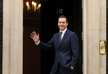 George Osborne arrives at 10 Downing Street as Britain's Prime Minister David Cameron begins to appoint his cabinet after securing a majority goverment, in central London, May 8, 2015. REUTERS/Phil Noble