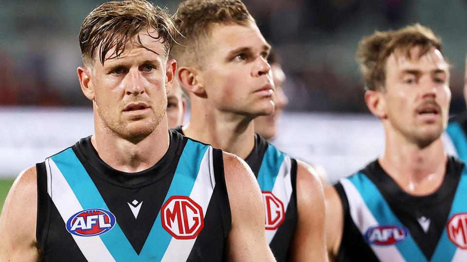 Port Adelaide wer thumped by reigning premiers Melbourne on Thursday night, held goalless in the first half. (Photo by James Elsby/AFL Photos via Getty Images)