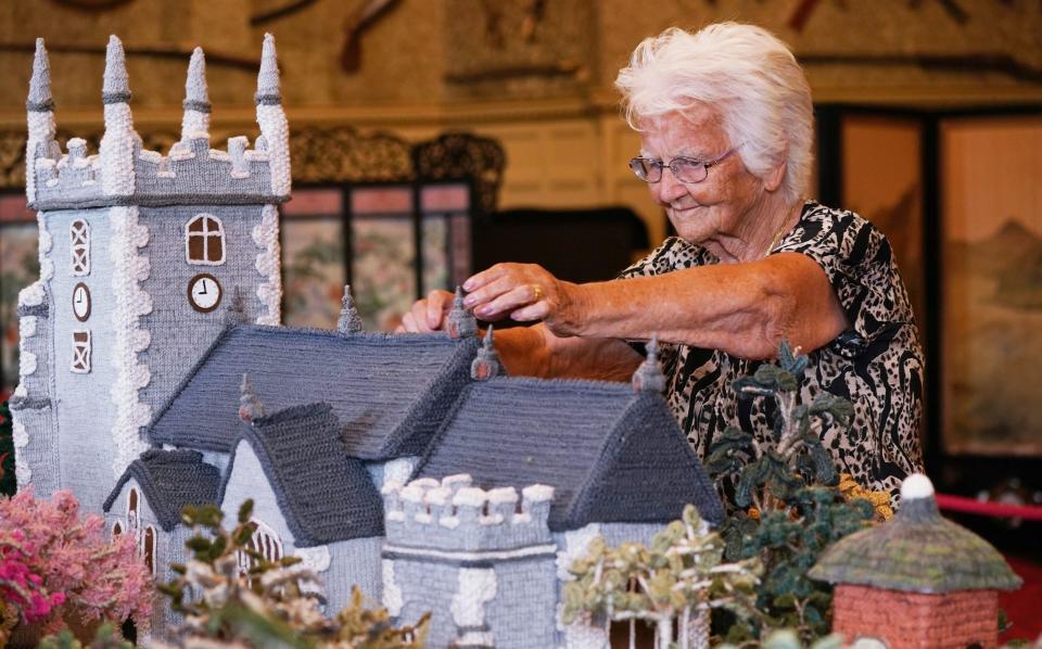 Margaret Seaman, 92, was crowned Oldie Champion Knitter of the Year after creating an 18ft-long knitted model of Sandringham - Yui Mok/PA Wire