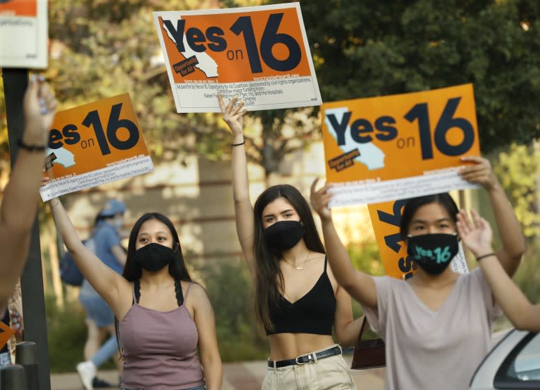 Los Angeles, California-Oct. 16, 2020-Students rally at UCLA in support of Proposition 16, on Friday Oct. 16, 2020. Proposition 16 would overturn California's ban on affirmative action, potentially creating opportunities for Latino, Black, Asian and women-owned companies to win contracts for millions of dollars in public contracts. Supporters of the proposition, which would also allow to factor race and ethnicity into university admissions. (Carolyn Cole/Los Angeles Times)