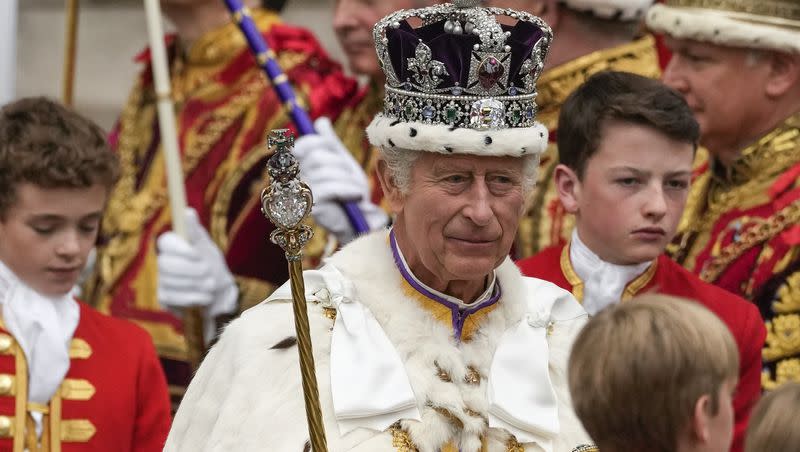 Britain’s King Charles III departs Westminster Abbey after his coronation ceremony in London Saturday, May 6, 2023.