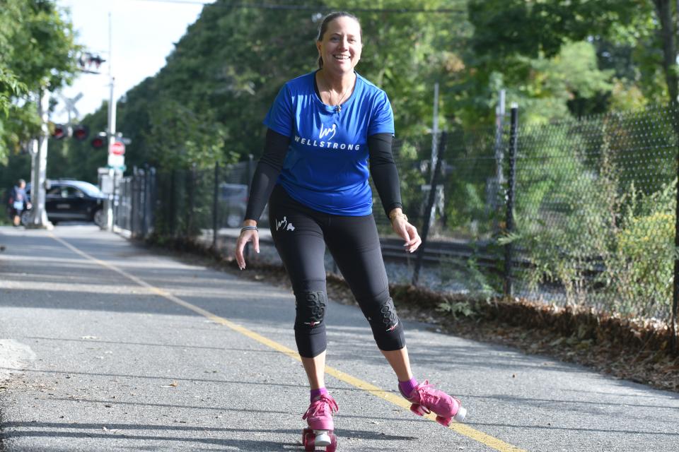 Jamie Schuh rolls down the Shining Sea Bikeway in Falmouth on Sept. 30 as she starts the first of her 10-day Wellstrong Roll For Recovery fundraiser. Schuh plans to ride 20 miles a day, from North Falmouth to Woods Hole and back, for a total 200 miles.