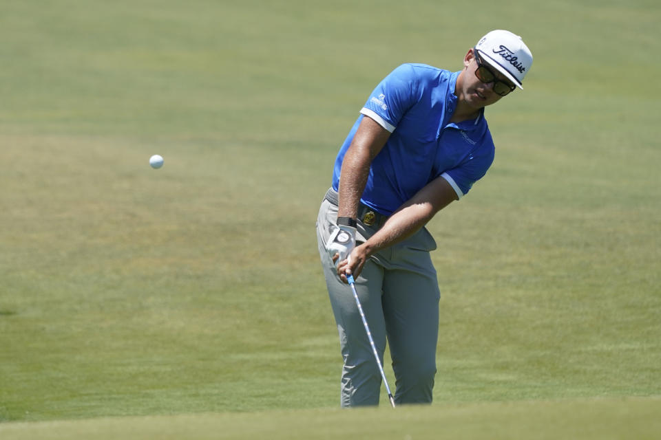 Garrick Higgo, of South Africa, chips up to the first green during the second round of the PGA Championship golf tournament on the Ocean Course Friday, May 21, 2021, in Kiawah Island, S.C. (AP Photo/Matt York)