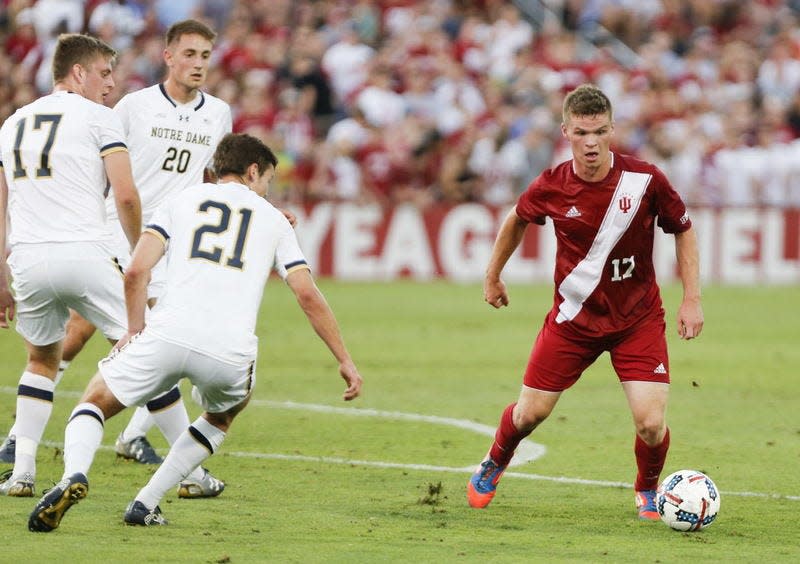 Jeremy Hogan | Herald-TimesIndiana’s Jeremiah Gutjahr (17) advances in the box against Notre Dame on Sept. 26, 2017. The Bloomington North graduate started the first 10 games of the season before a knee injury ended his 2017 campaign. Gutjahr is one of three Bloomington natives on the roster for the Hoosiers.