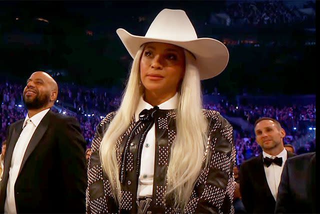 <p>CBS</p> Beyoncé watches husband JAY-Z accept the Dr. Dre Global Impact Grammy Award.