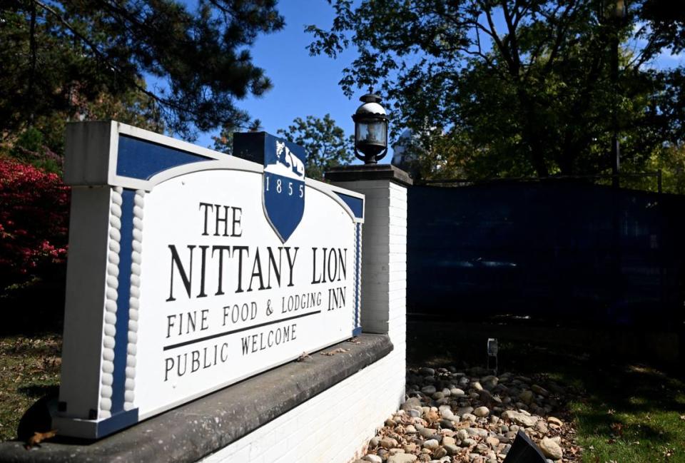 Construction fences are placed around the Nittany Lion Inn Monday as renovations continue.