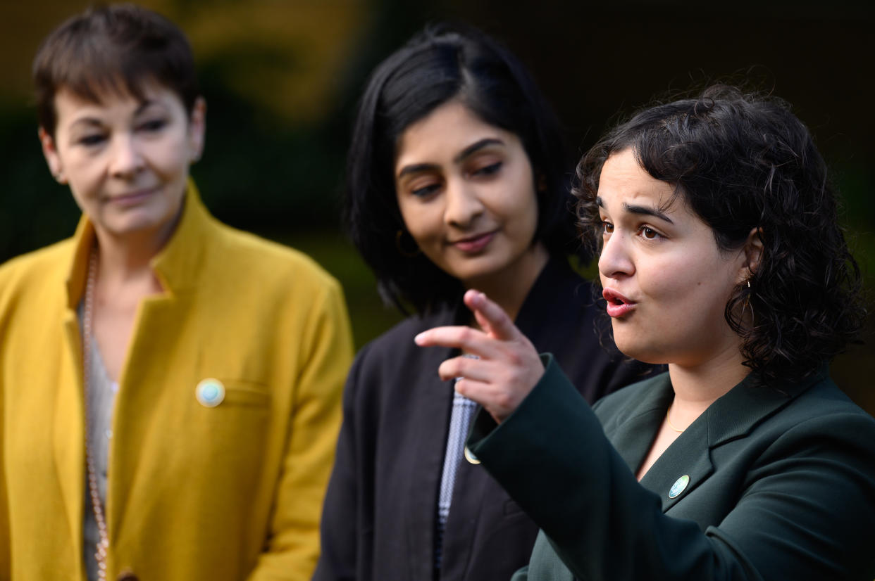 LONDON, ENGLAND - OCTOBER 20: Caroline Lucas MP (L), Zarah Sultana MP (C) and Nadia Whittome MP (R) speak to supporters on October 20, 2021 in London, England. At Labour's recent conference in Brighton, the party set out a raft of measures to encourage a rapid transition to a low-carbon economy. (Photo by Leon Neal/Getty Images)