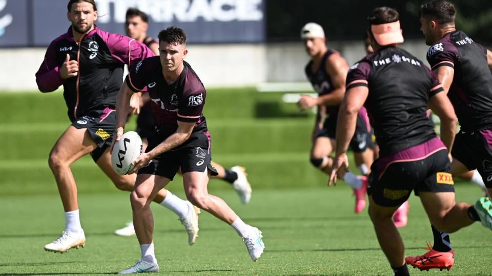 Jock Madden (centre) in training for the Broncos.