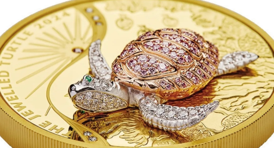 Gold coin with jewel-encrusted turtle on it