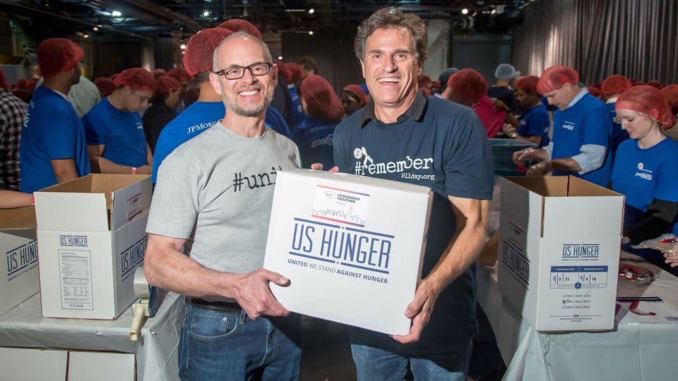 9/11 Day founders, Jay Winuk and David Paine, at their annual meal packing event.  - courtesy Jay Winuk