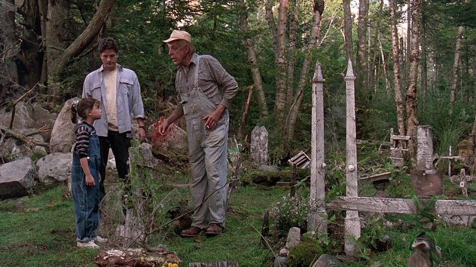 People standing in a cematary