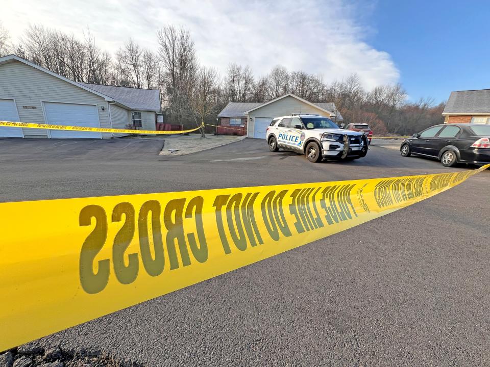Much of Landings Court, a residential complex at Home and Walker Lake roads, was covered in police tape after a standoff and multiple shootings Sunday evening.