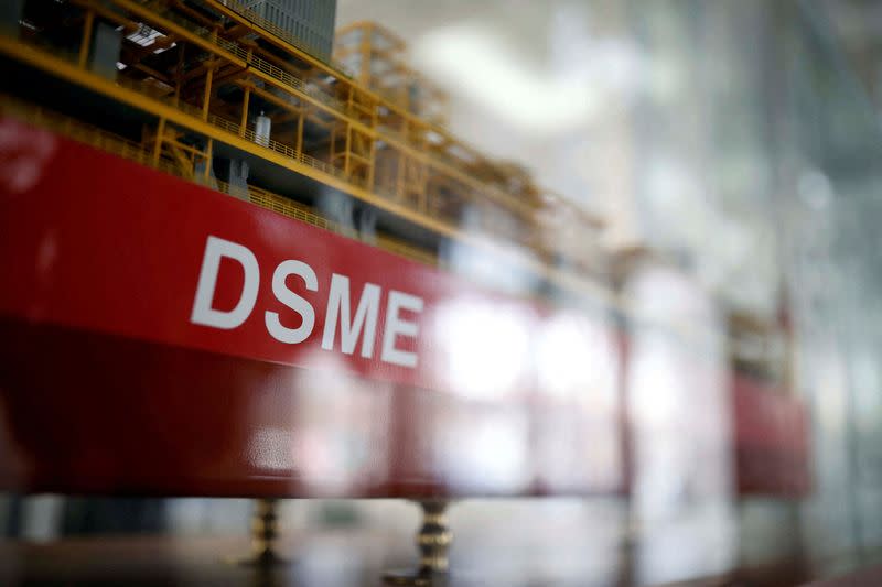 FILE PHOTO: The name of Daewoo Shipbuilding & Marine Engineering Co is seen on a replica ship displayed at its building in Seoul